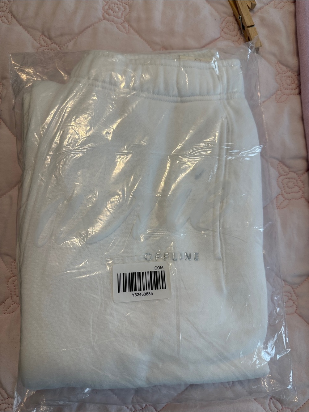 Womens White Sweatpants with Subtle Embroidered Detail. Last picture shows style